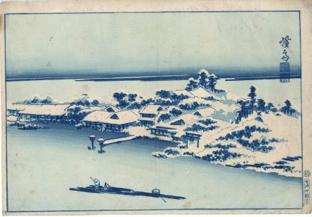 隅田川のほとりに佇む雪に覆われた神社